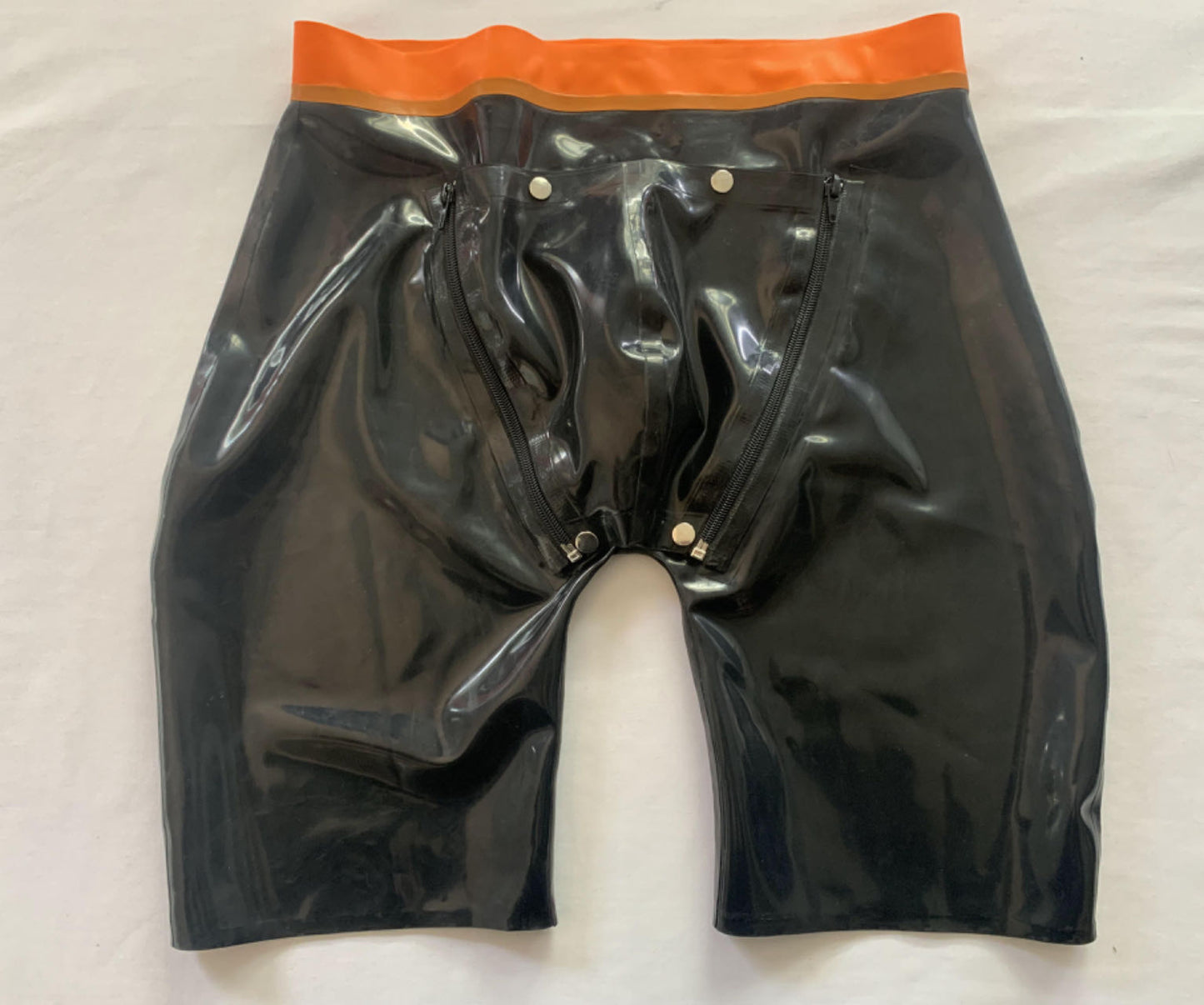 a black mens latex shorts