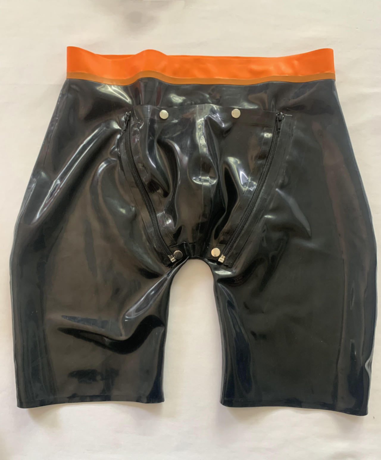 a black mens latex shorts