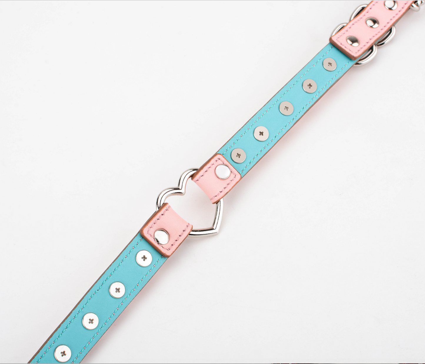 a pink spiked collar choker