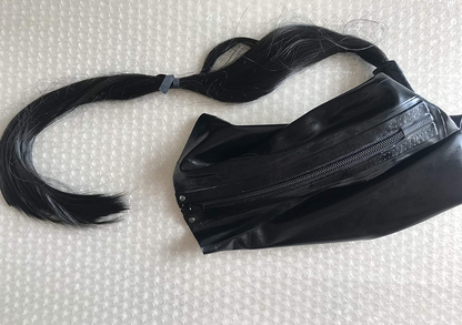 a black latex hood with ponytail