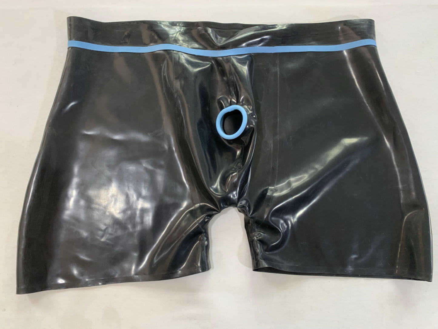 a black mens latex underwear with ring hole