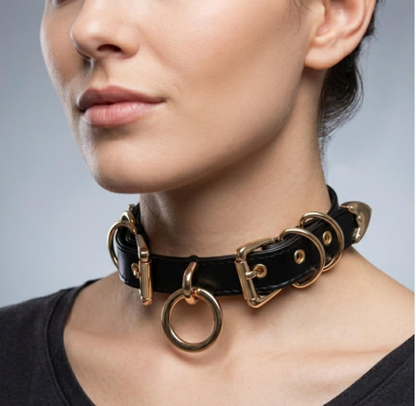 black faux leather o ring collar choker with polished gold alloy buckles on model neck front view