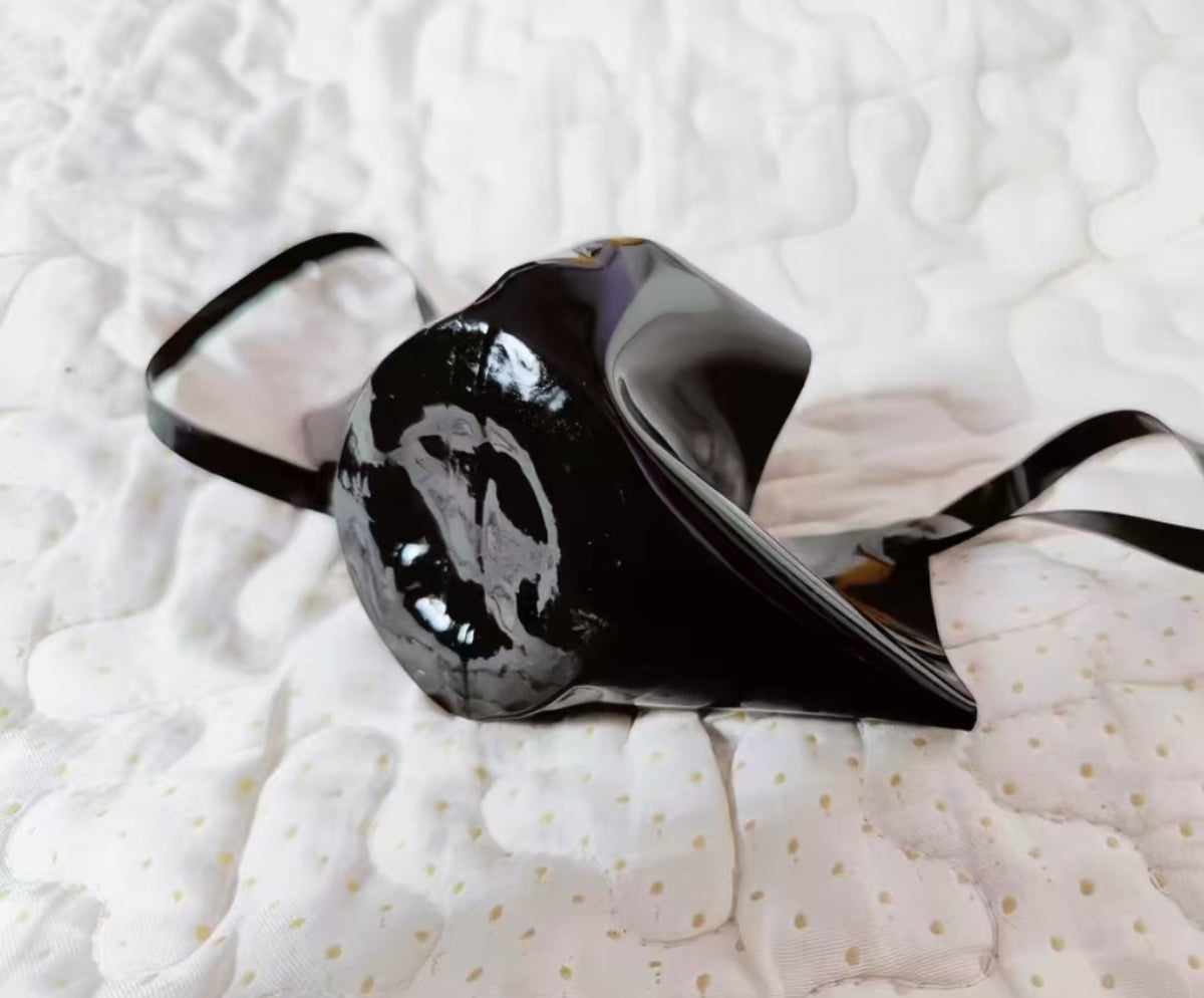 black high shine latex mask with integrated rubber mouth gag and ear loops