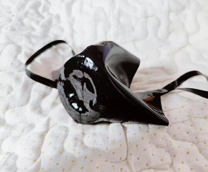 black high shine latex mask with integrated rubber mouth gag and ear loops