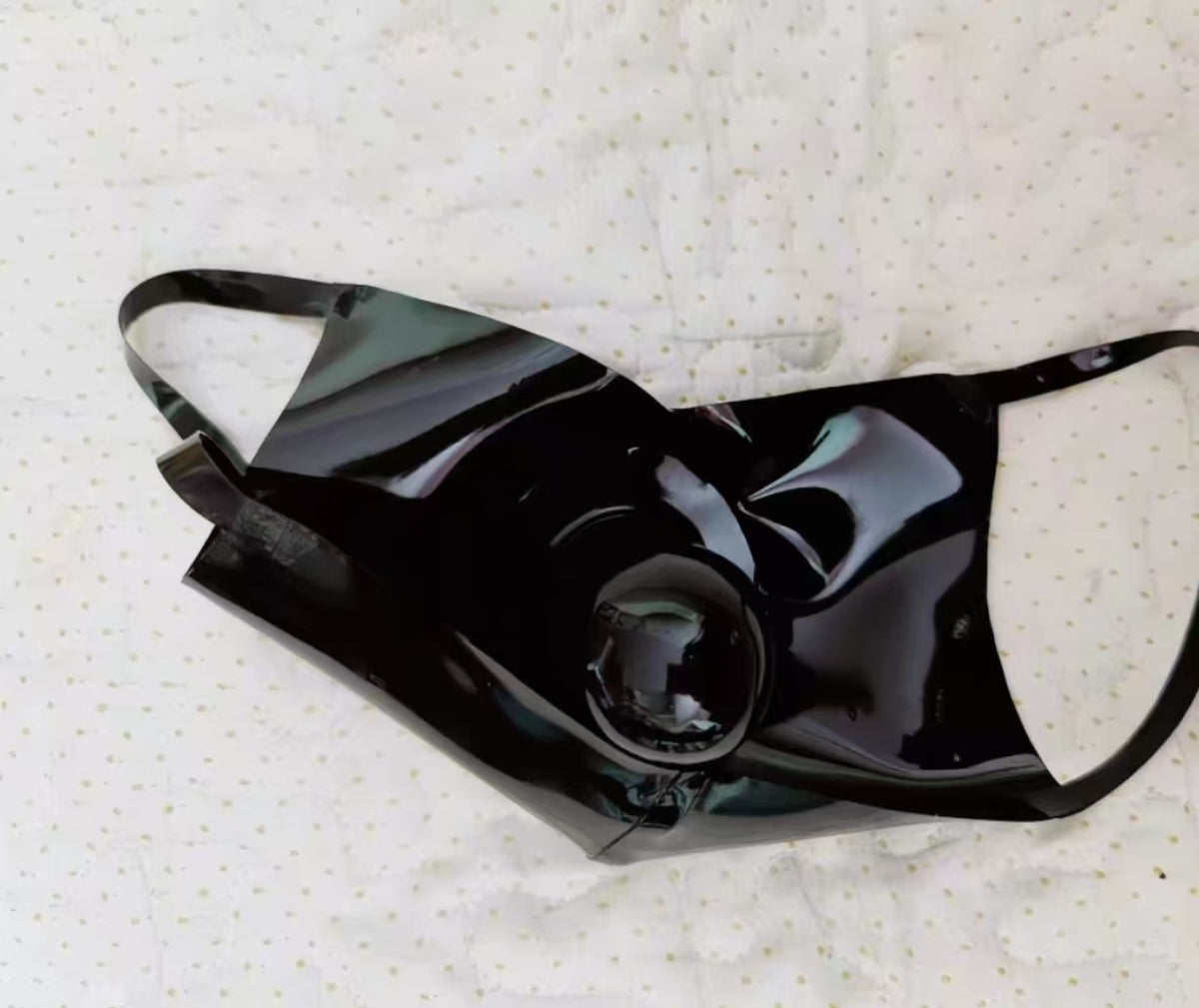 natural rubber latex gag mask with smooth molded oral gag close up