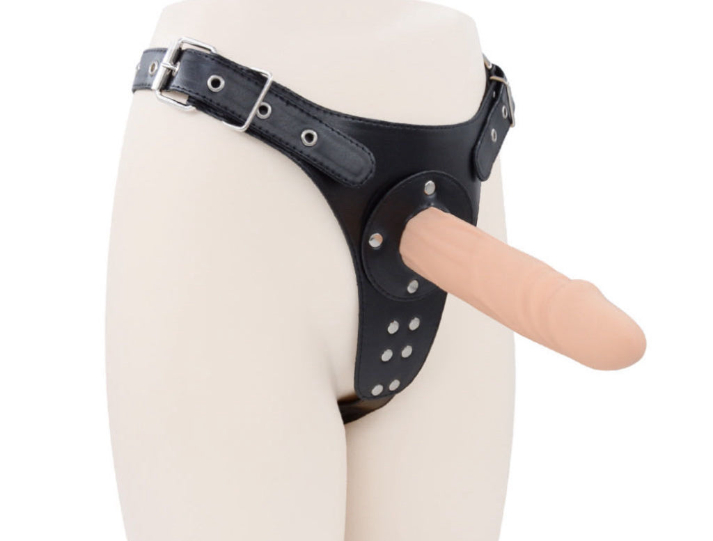 a strap on dildo harness with flesh dildo