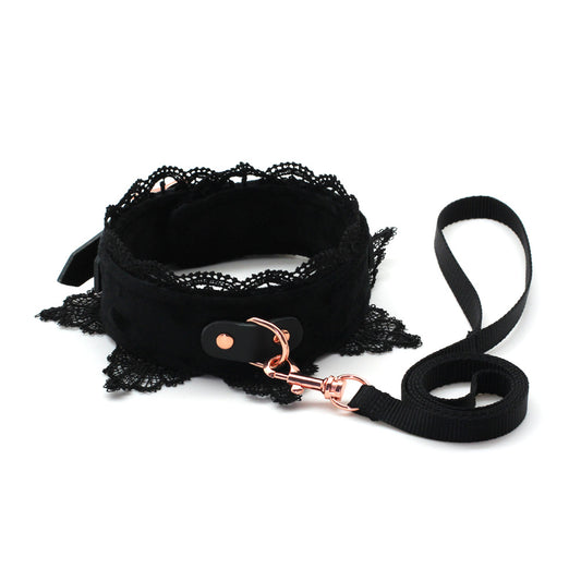 a black submissive day collar and leash set