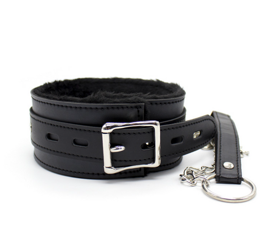 a black leather bondage collar and leash set