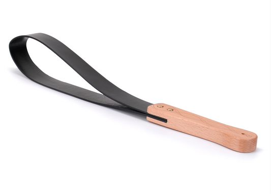 a spanking strap bdsm paddle